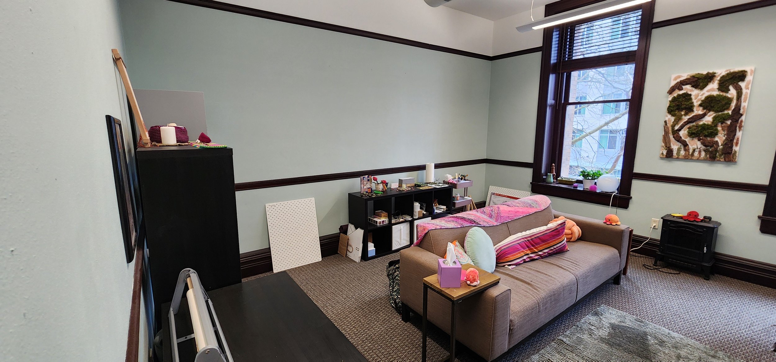 Waiting room with seating and windows